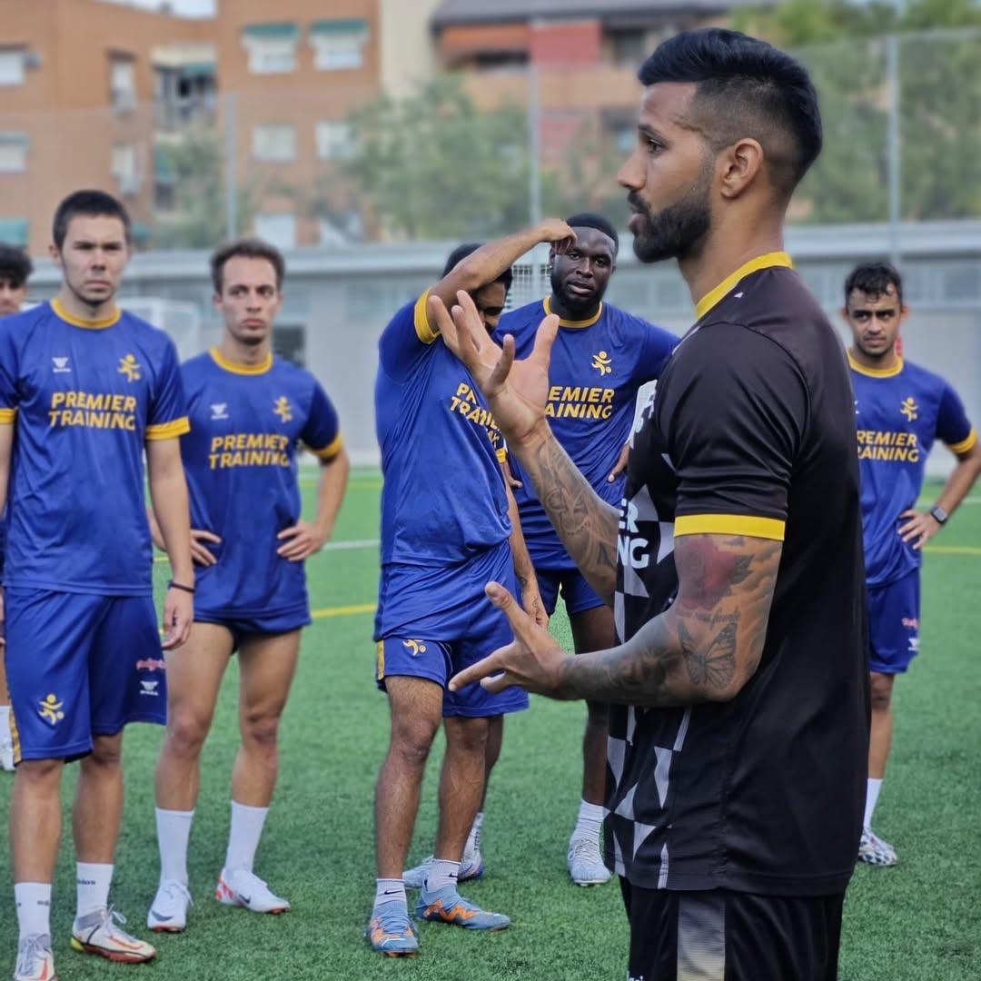Coach leading training session